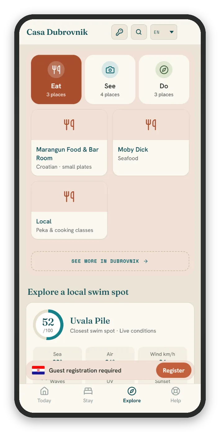 The Explore screen: nearby beach conditions and a curated Eat, See and Do list.
